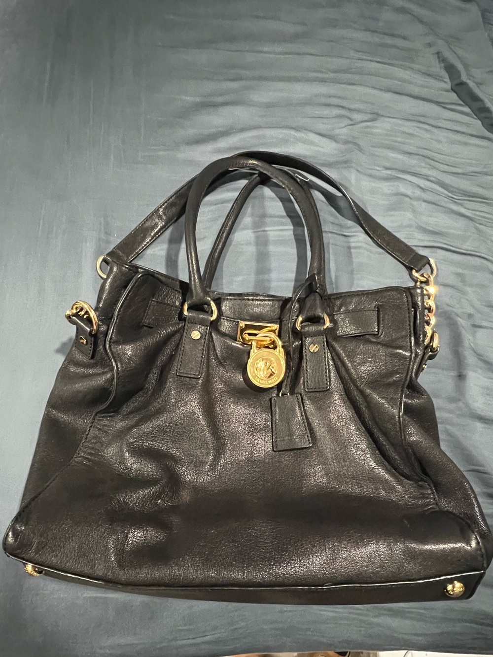 Michael Kors Black Leather Tote with Gold Medallion
